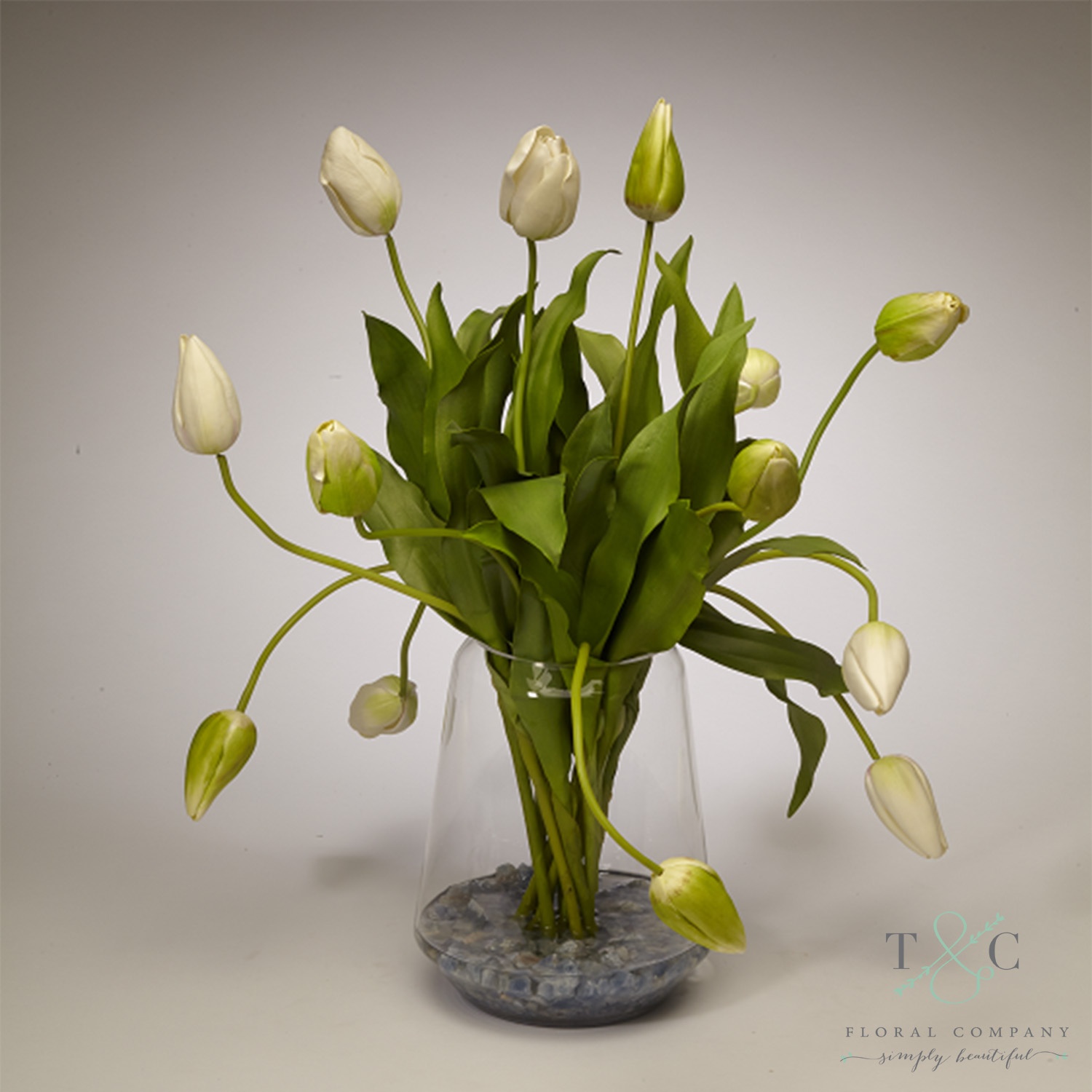 White Tulips in Clear Glass Vase - 21L x 21W x 24H Floral Arrangement